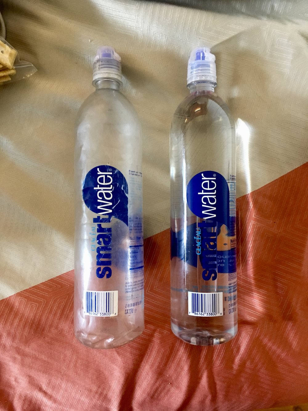 1L  Smartwater  bottles are a popular choice on the PCT because they don’t weigh much and can screw directly on a Sawyer water filter.