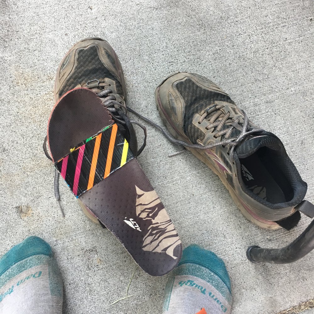 My DIY insole repair next to my sore, numb feet in Old Station, CA