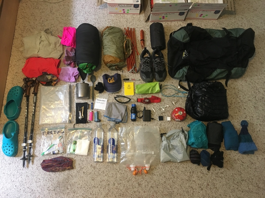 Look at all this stuff I bought so I could go live in the woods for four months. I ended up dropping the crocs, pack towel, notebook, iPod, two tent stakes, and my stove bag.
