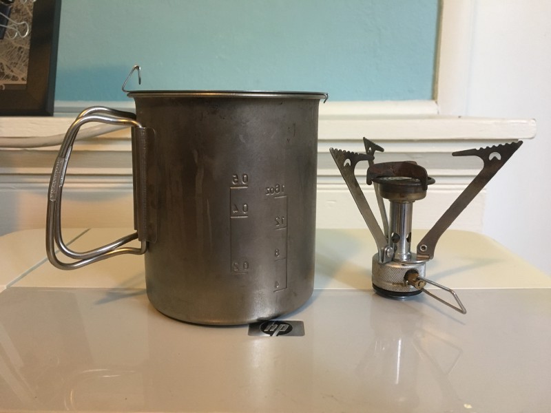I carried my stove inside my pot and used a rubber band to hold it all together.